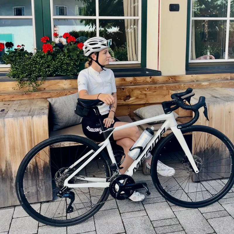 Simona in front of the hotel Ostaria Posta